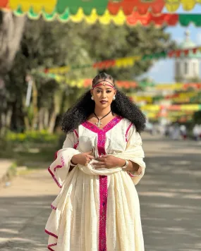 Elegance in Pink: Handwoven Fetil Fabric and Cotton Blend Habesha Kemis - A Stunning Ethiopian Dress